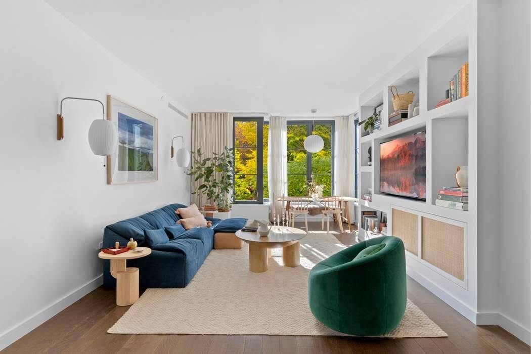 PRIVATE PARKING SPOT INCLUDED Natural light pours into this generously proportioned two bedroom, two bath South facing chic condo residence where undisturbed quiet living affords a lifestyle of effortless tranquility.
