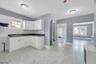 Kitchen with ceramic floors.