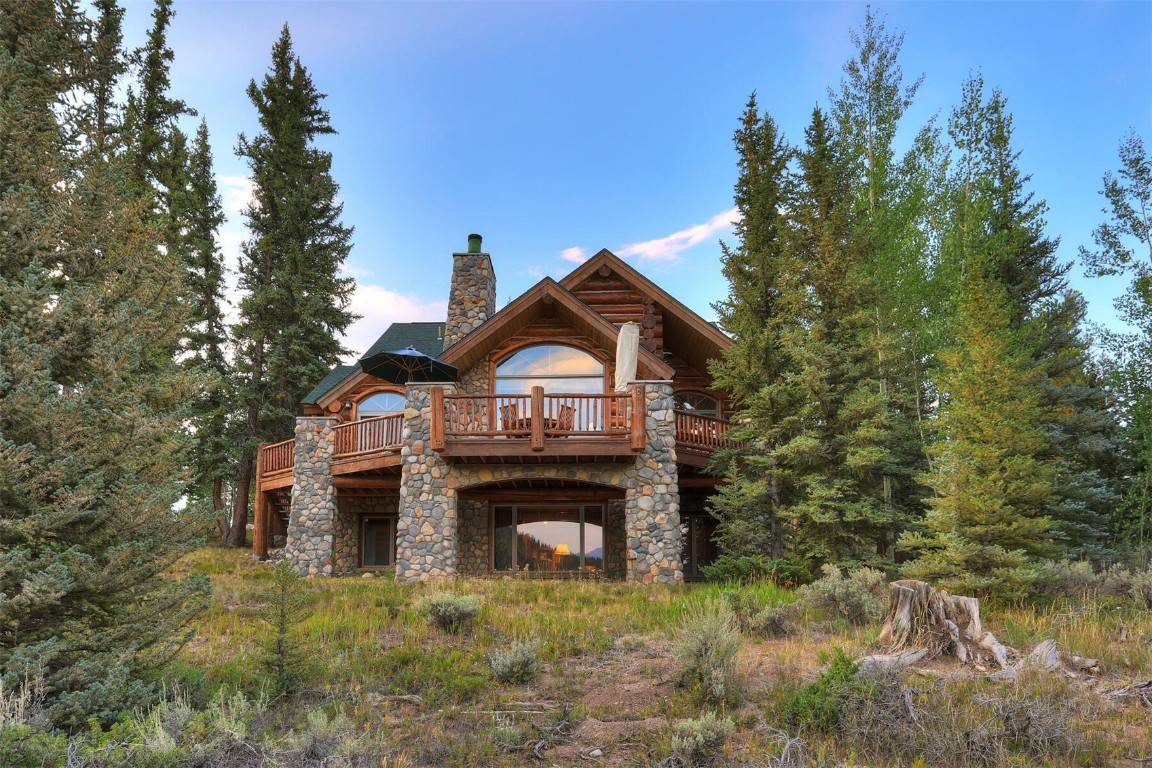 With the national forest as your backyard, this custom log home in Keystone, Colorado offers an unparalleled mountain retreat.