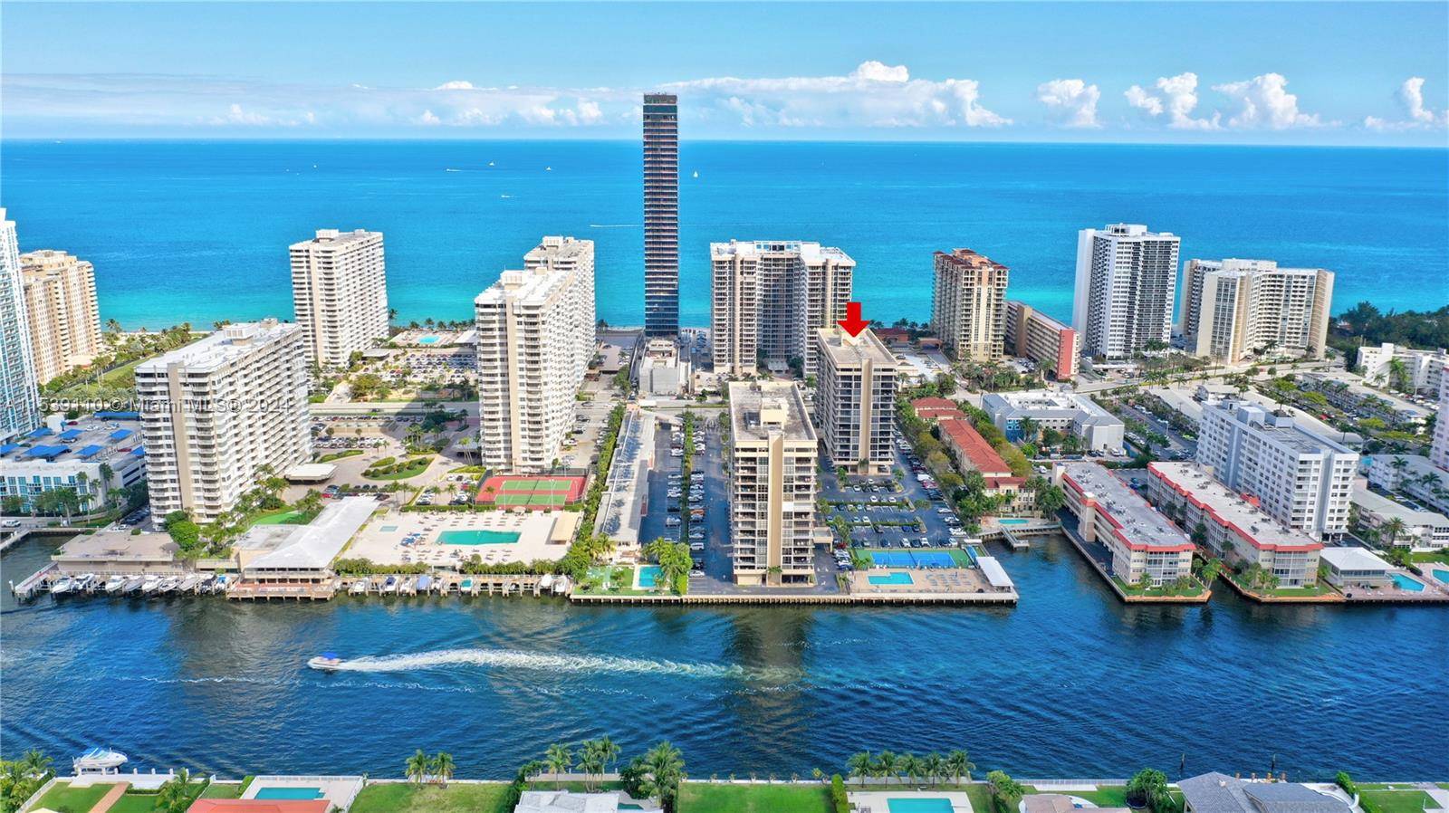 STEP INSIDE THIS STUNNING LUXURY MODERN COMPLETELY RENOVATED 2 BEDROOM, 2 BATH DEN CORNER UNIT WITH WRAP AROUND BALCONY AND DIRECT BEACH ACCESS !