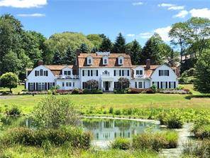 Idyllic Setting ! Picture perfect Gambrel Colonial home on 4.