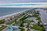 A stunning overview of the neighborhood reveals the property’s unbeatable setting between the Atlantic Ocean and Indian River, with nearby public dock