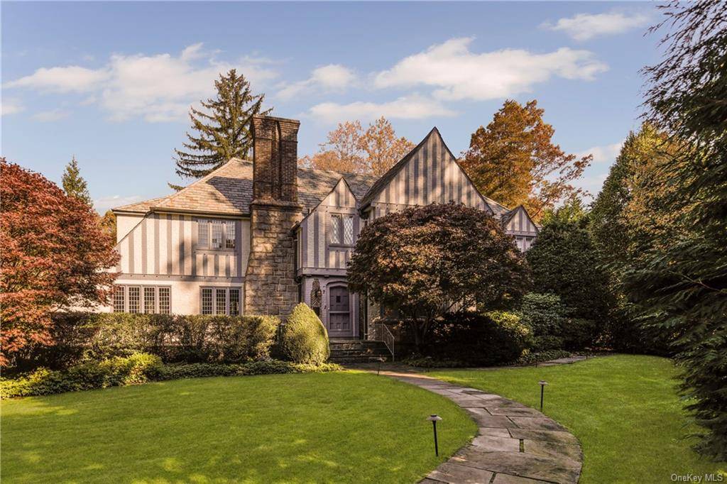 Beautifully designed Tudor home on a half acre of attractively landscaped level property on the former Crownlands estate just a short walk to the Bronxville school, village and train.