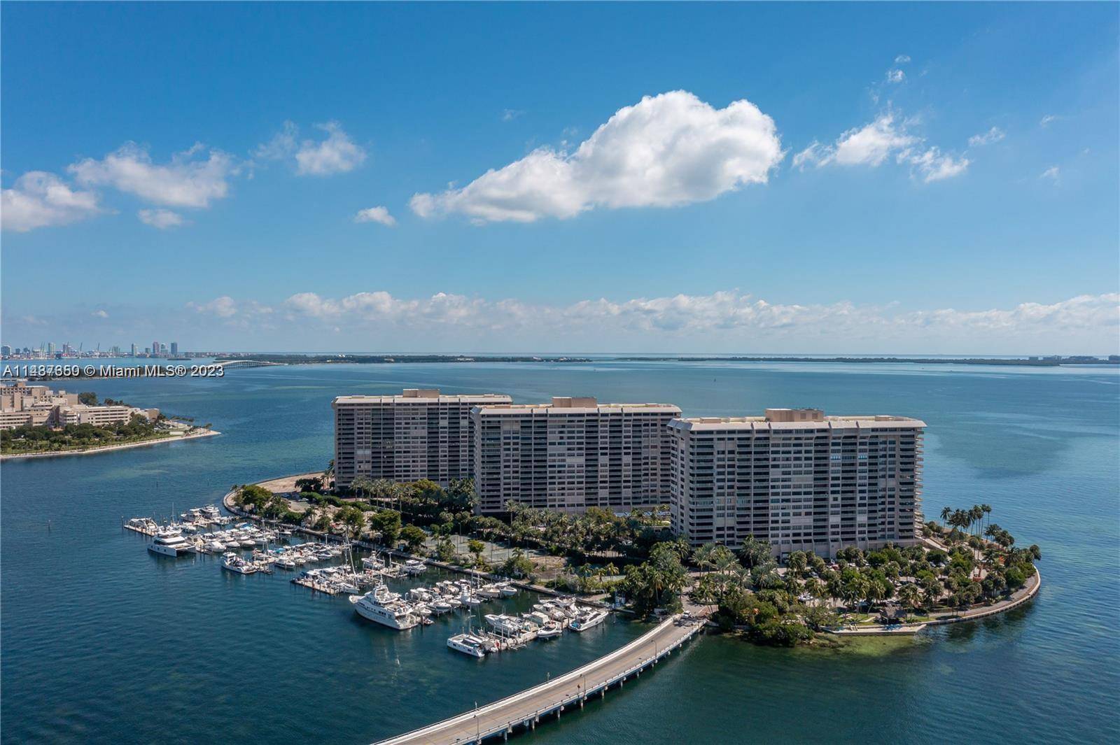 Luxurious 2 Bed, 2 Bath Remodeled Residence on Exclusive Grove Isle This remodeled 1, 642 sq.