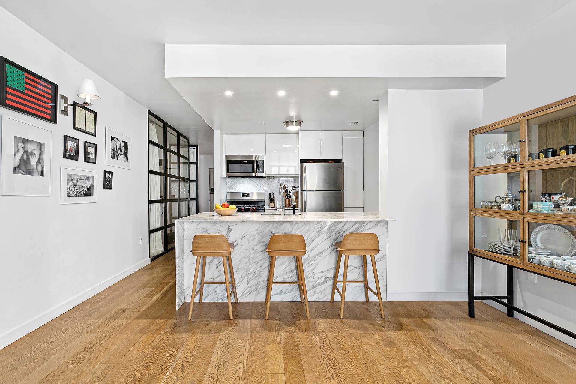 Truly one of its kind, this expansive two bedroom two bathroom home sits in one of the most architecturally striking luxury condominiums in Central Harlem.