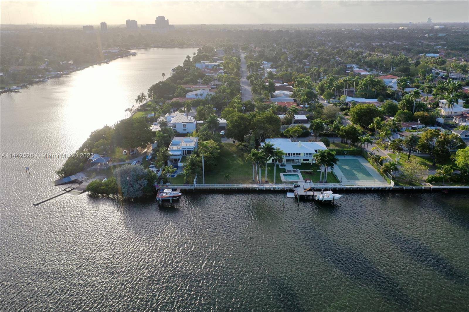 One of a kind bayfront lot with full plans approved to build a 5900 sf under air modern villa.