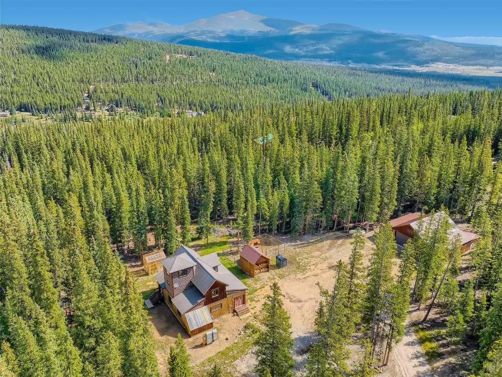 M B Enjoy the views, privacy, and peaceful serenity of this Luxury Rustic Mountain House that sits on 8.