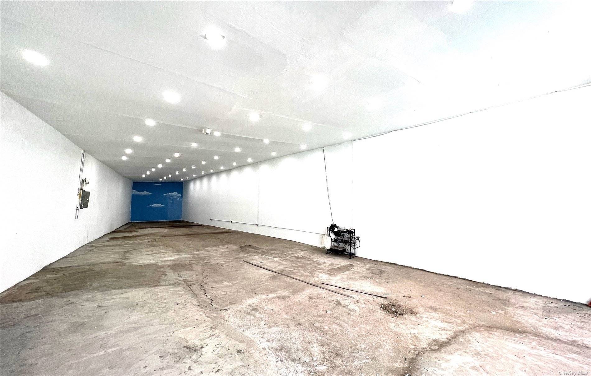Gorgeous 3000 SF Retail Showroom with office or storage space with high Ceilings with recessed lighting throughout.
