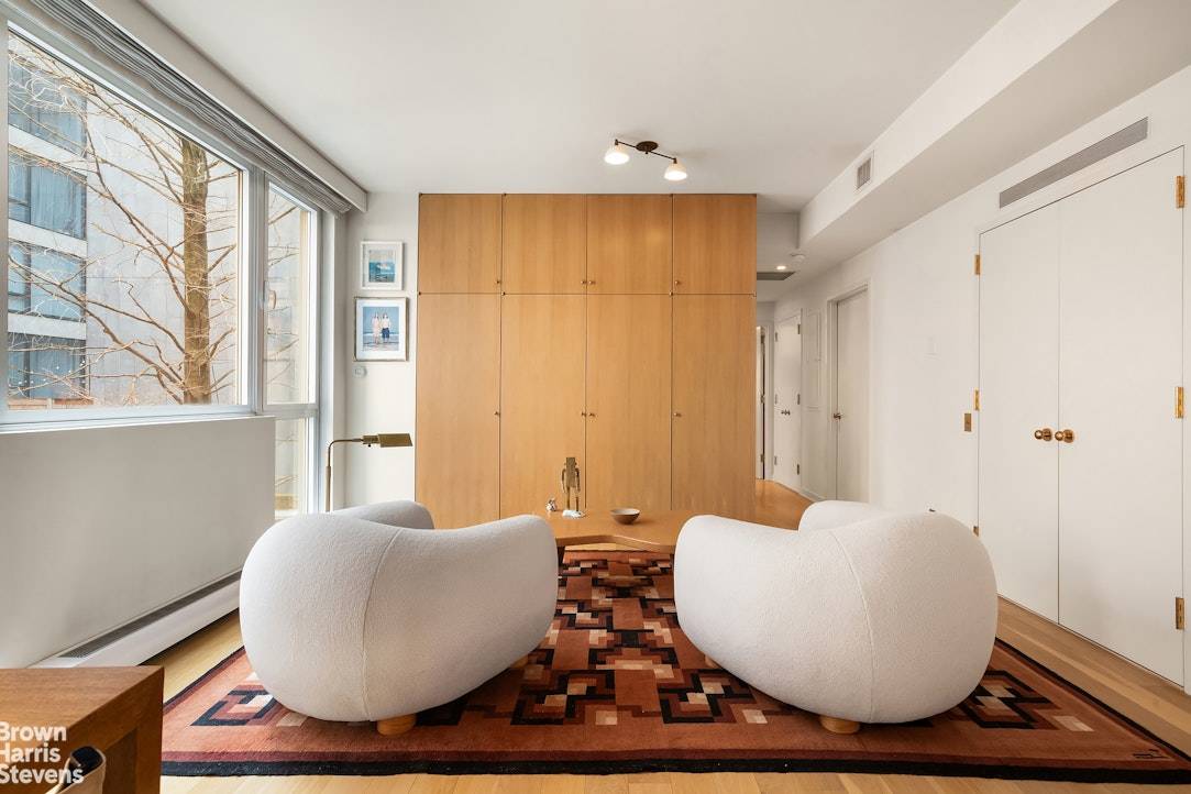 Rarely available two bedroom with balcony at the boutique Renwick Modern condominium, on highly coveted Renwick Street, just below Spring Street in Hudson Square.
