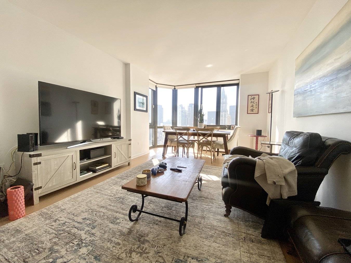 Huge 1 Bedroom, 1 Bathroom apartment with South Facing exposure featuring stunning city and water views, great light, a galley kitchen and great closet space.