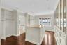 Primary suite with private balcony, huge en suite bathroom and walk-in closet