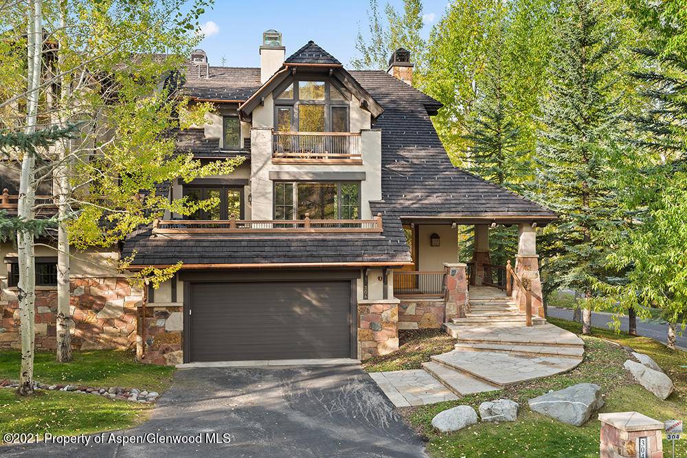Situated in one of Snowmass' most coveted neighborhoods, this gorgeous 4 bedroom, 4.