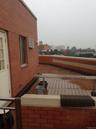 Patio / terrace with a city view