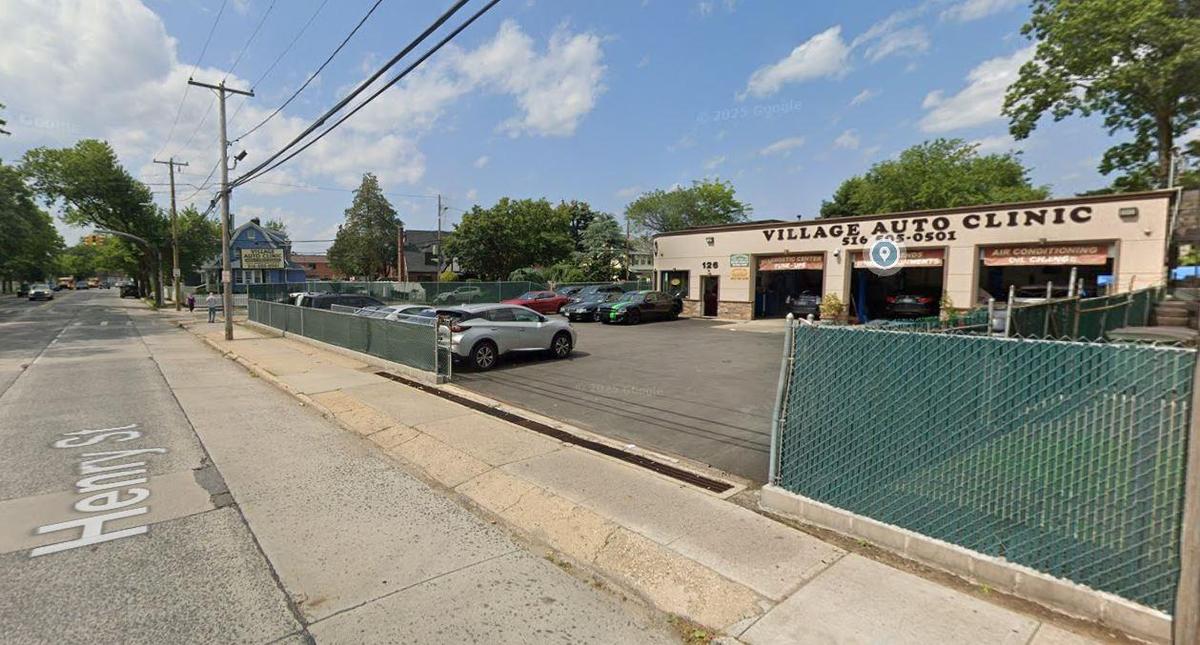 View of asphalt street with sidewalks