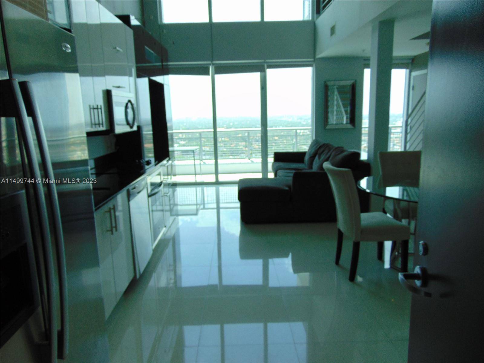 Amazing 2 story loft, 1 bed 2 full baths in high rise with spectacular views.