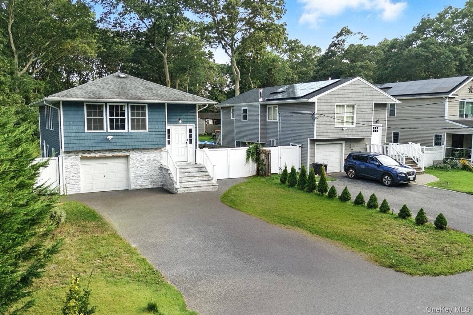 This beautifully updated 4 bedroom, 2 full bathroom home offers an open concept layout with a modern kitchen featuring stainless steel appliances.