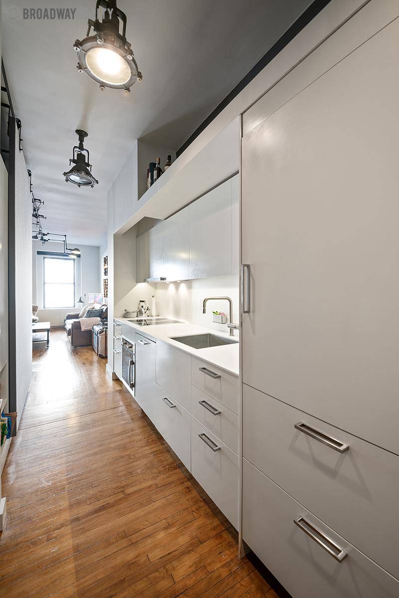 Beautifully furnished one bedroom residence featuring Liebherr refrigerator freezer, as well as Corian countertops and task lighting.