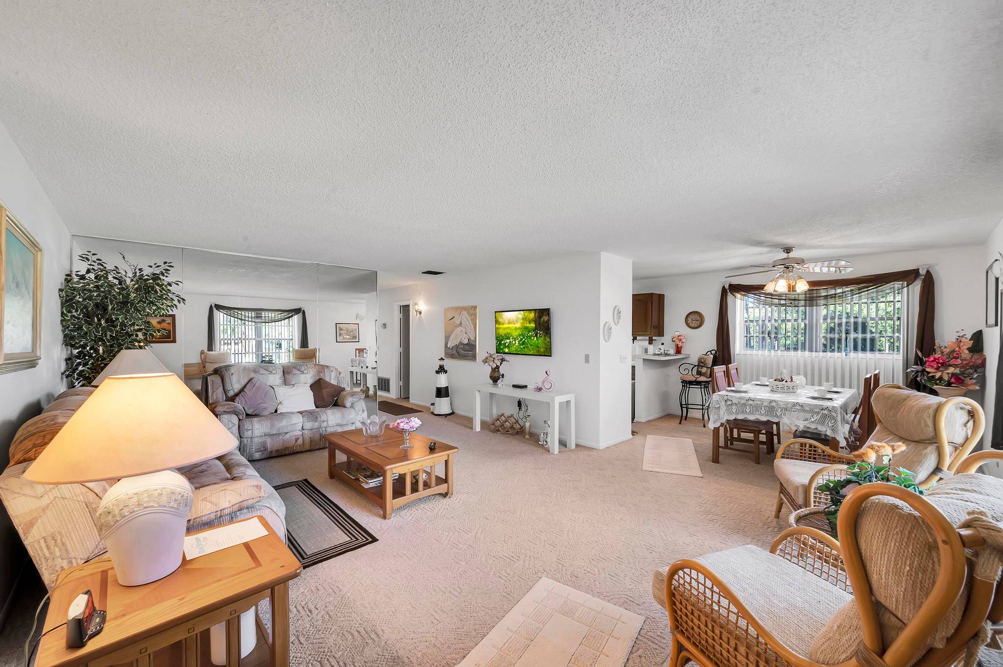 This meticulously maintained condo offers 2 bedrooms, 2 bathrooms, and carpet throughout for cozy comfort.