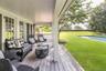 Covered Porch off Living Room to Pool