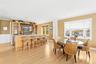 Wet Bar with Seating and Additional Dining Area