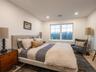Bedroom featuring recessed lighting and light wood finished floors