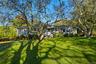 View of front of house featuring a front lawn