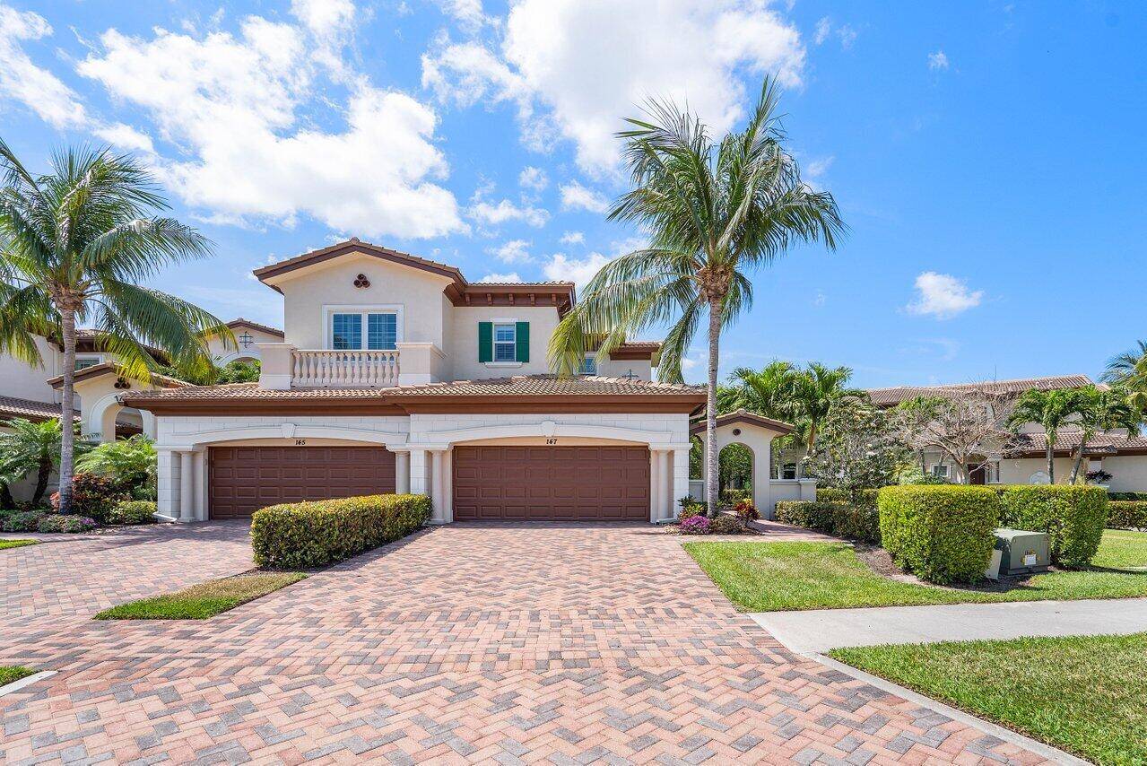 Welcome to this luxurious 3 bedroom, 3 bathroom residence nestled in the prestigious community of Jupiter Country Club.