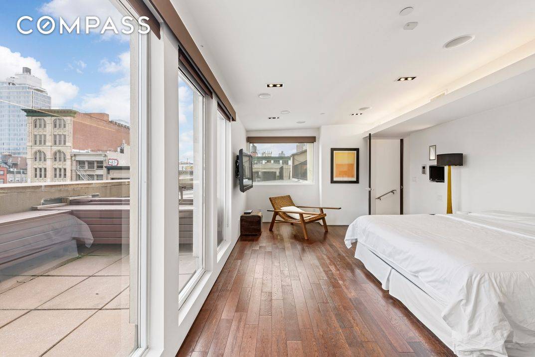 Showings and Open House by Appointment Enjoy privacy and serenity in your gut renovated triplex penthouse located on the nexus of SoHo and Tribeca, featuring a large private terrace with ...