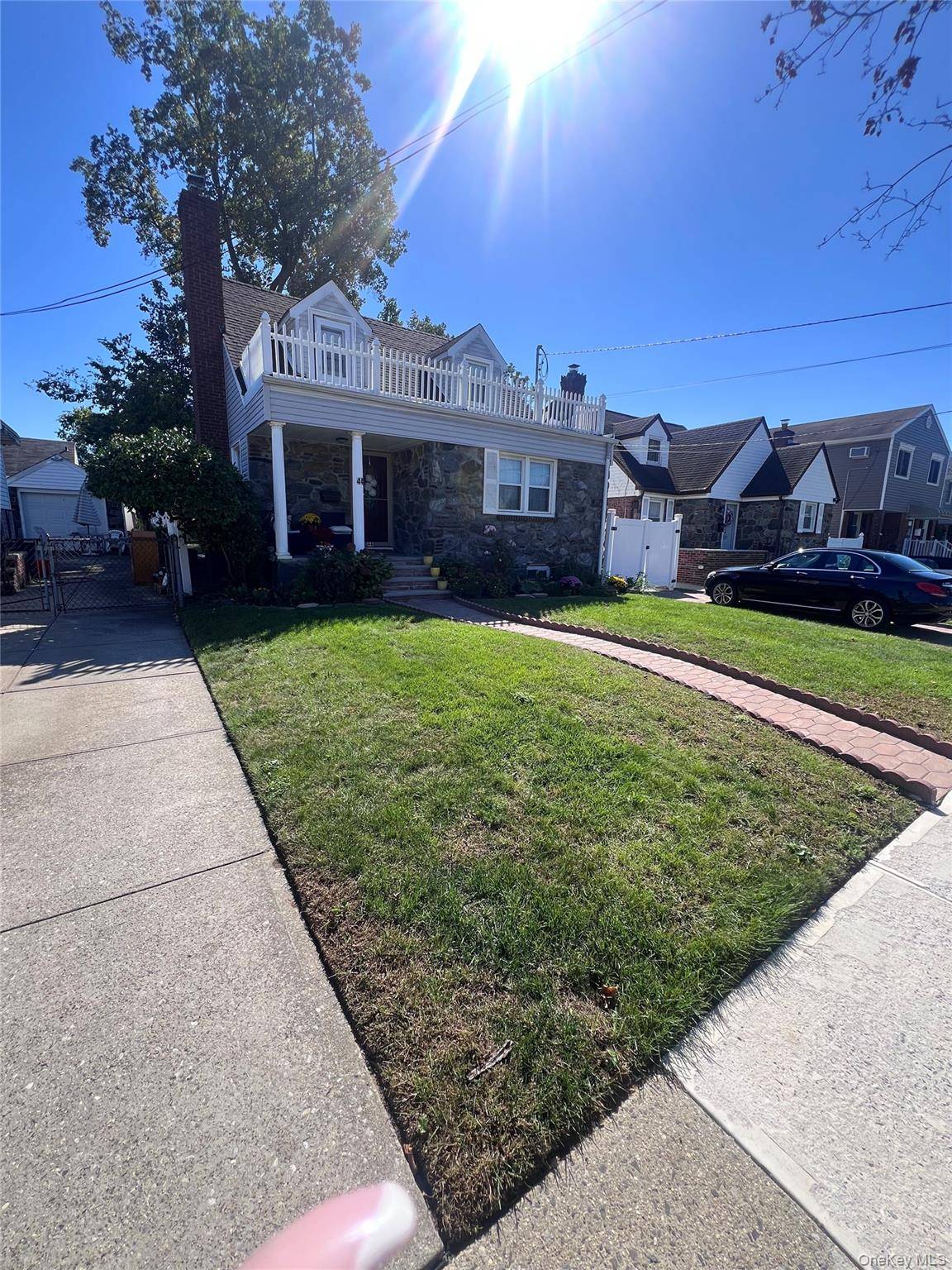 Welcome to this beautifully maintained Cape Cod style home located in the heart of Valley Stream.