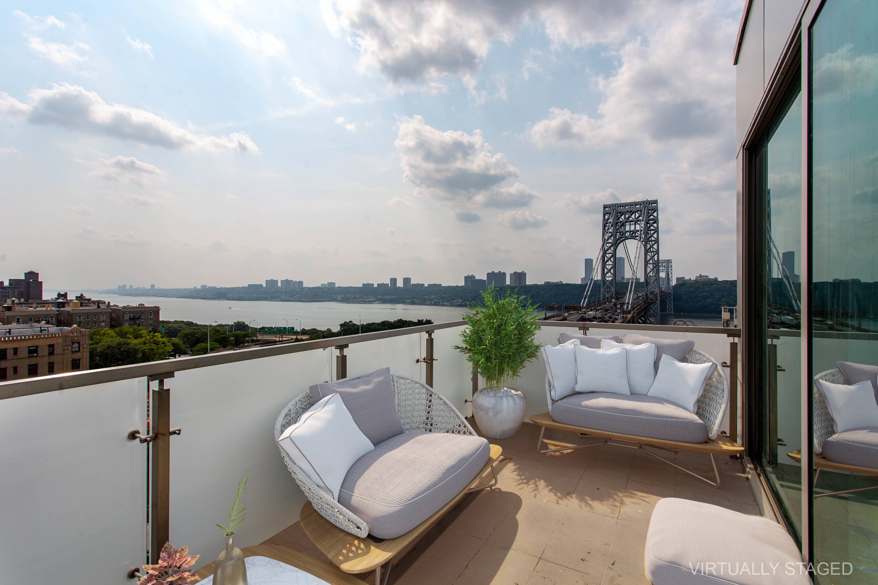 With sweeping views over the Hudson, Penthouse 8A is a large two bedroom, two full bathroom featuring floor to ceiling triple paned windows and a 281 SF private terrace.