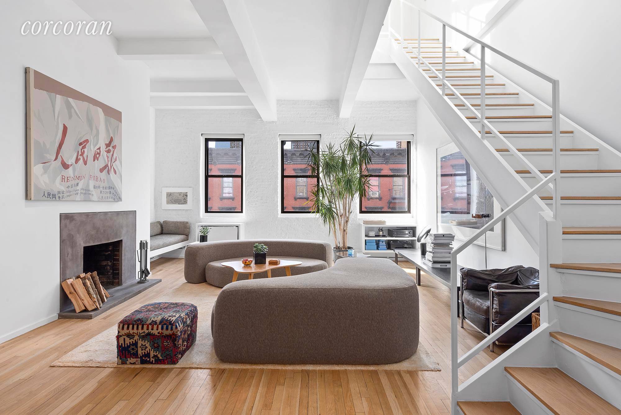 521 West 47th Street Sweeping views and outdoor space in this incredible duplex penthouse loft !