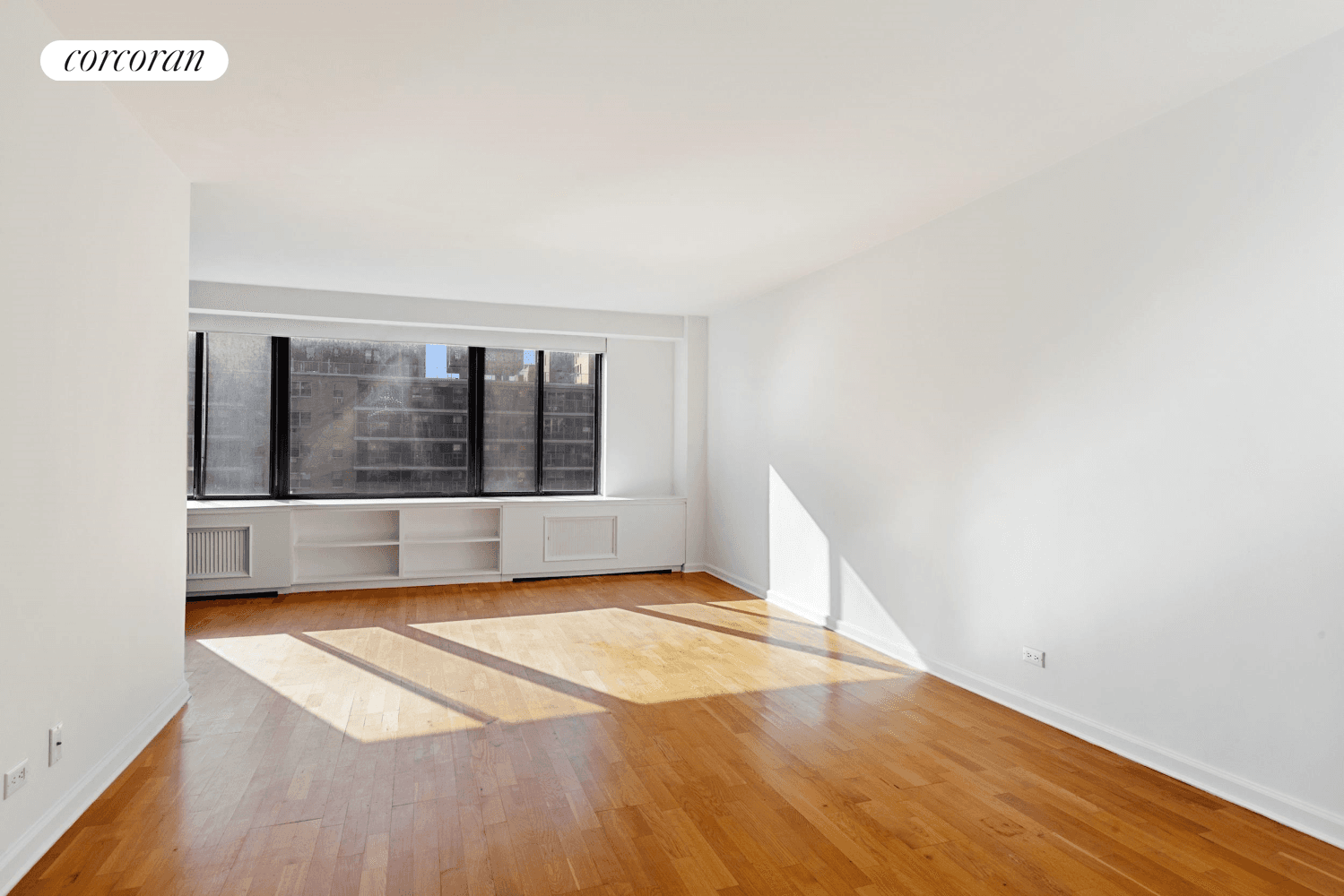 Bright and sunny south facing, high floor alcove studio apartment with open city and Central Park views !