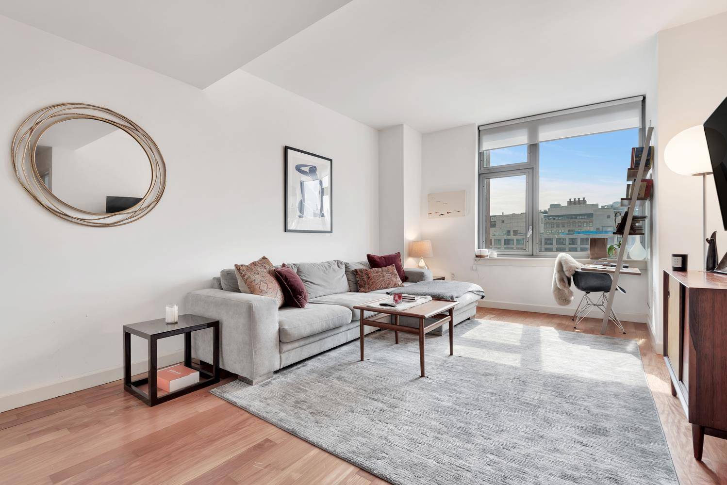 Residence 12L is a spacious one bedroom with unobstructed western views of downtown Manhattan and the Freedom Tower.