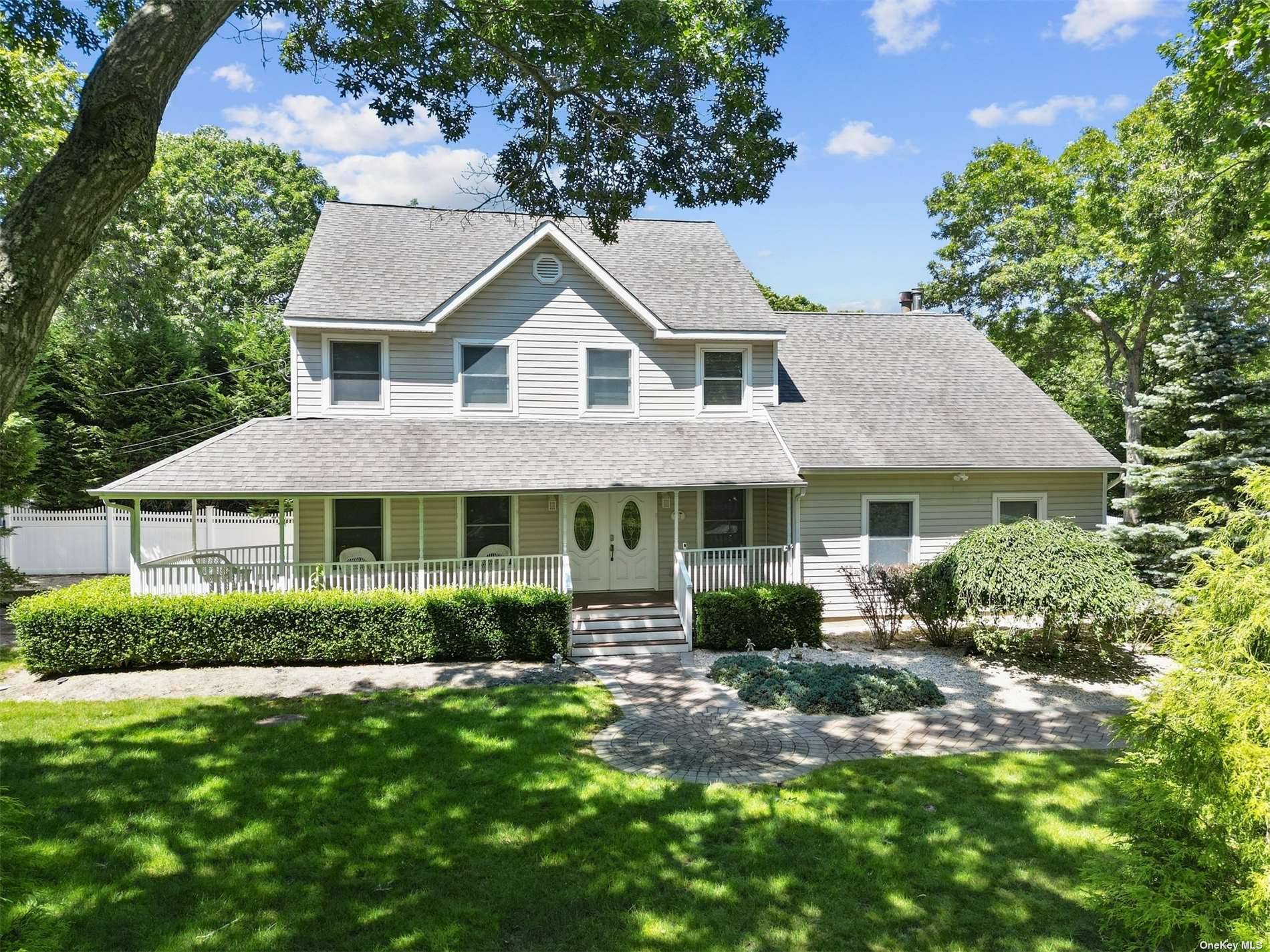 This luxurious 5 bed, 4 bath oversized colonial home with a wrap around porch sits on nearly an acre of beautifully landscaped property.