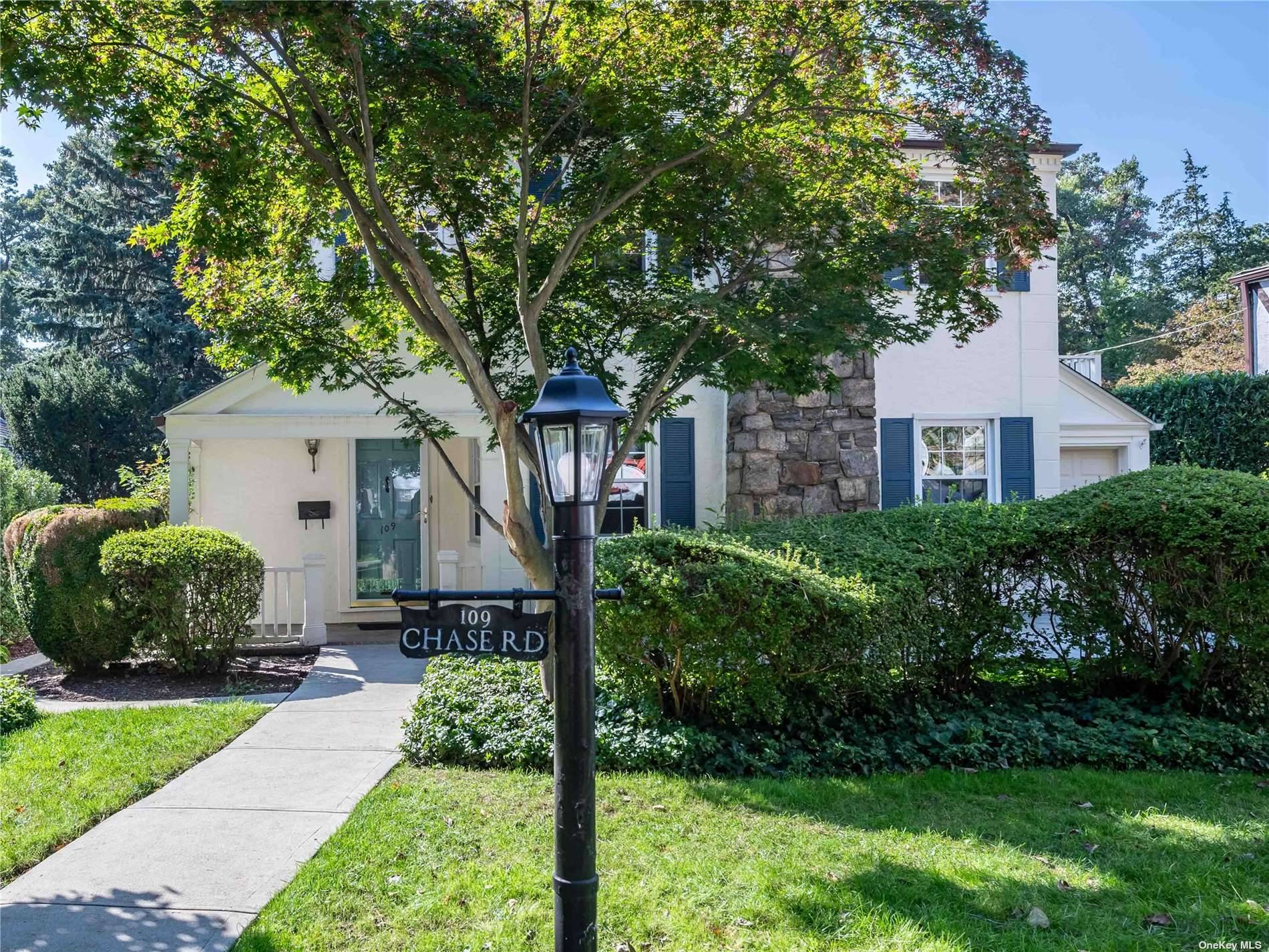 Nestled on a beautiful tree lined street, this completely renovated home checks all the boxes.