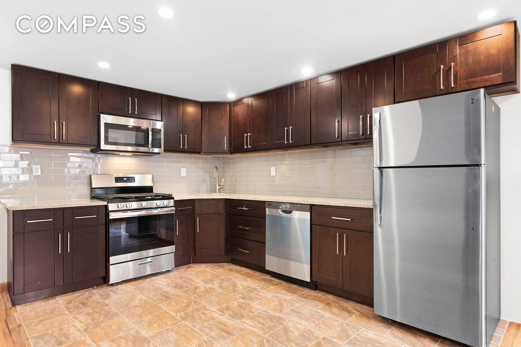 ImPECcably renovated 4 bed 2 bath duplex with private backyard.