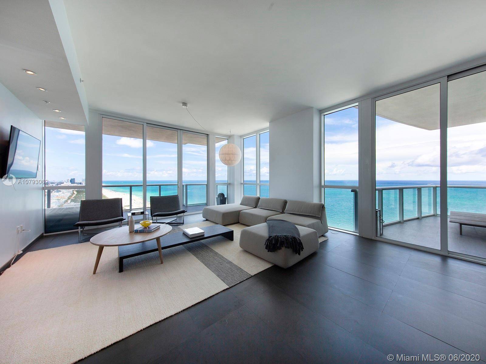 Beachfront corner with flow thru layout with generous living space and breathtaking ocean and city views.