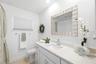 updated full guest full bathroom shared with back hall bedrooms