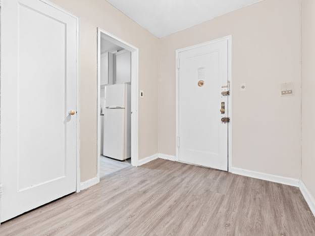Two bedroom apartment with hardwood floors throughout, Plenty of windows and closet space.