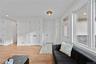 Living room with recessed lighting and light wood-style floors