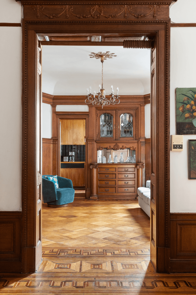 Immerse yourself in the timeless charm of Park Slope in residence 2 at 120 Prospect Park West, where an enchanting Victorian brownstone mansion awaits your arrival.