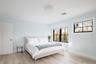 Bedroom featuring light wood-style floors, baseboards, and recessed lighting