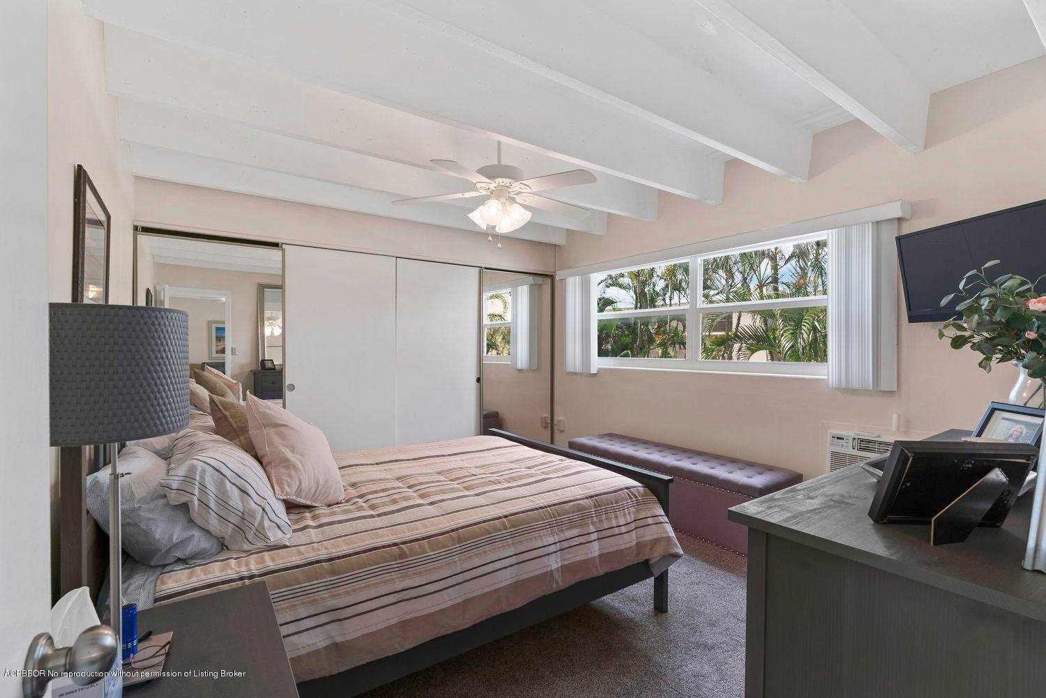 Lush palm trees will catch your eye as you enter this beautifully furnished turnkey Intracoastal front oasis.