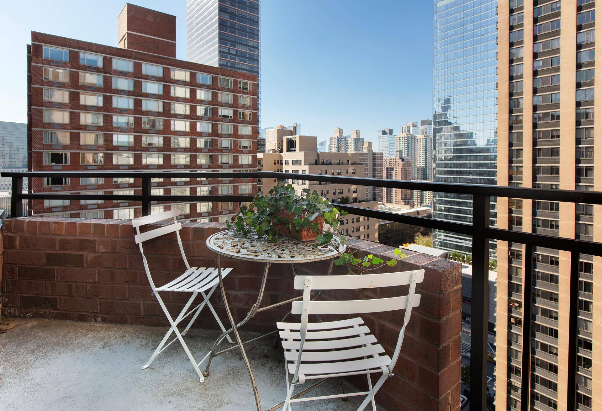 Beautiful, expansive junior one bedroom alcove studio with a private outdoor terrace and stunning city views.