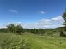 View of wooded area with a view of countryside