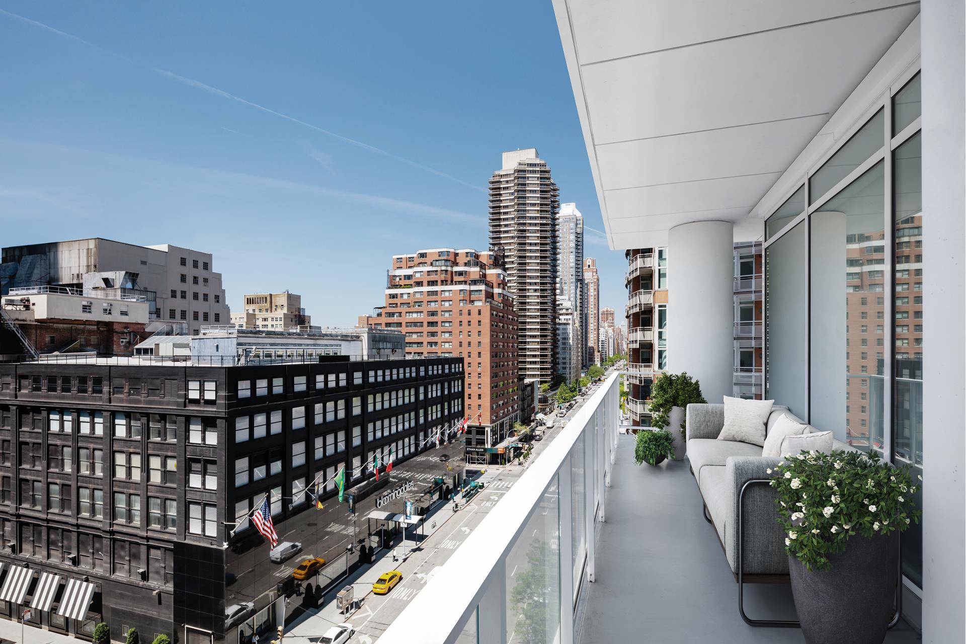 This spacious, corner 1, 416 square foot two bedroom, two and a half bath residence features a deep wraparound terrace overlooking Central Park, and western views of the Midtown skyline.