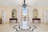 We meet you in the grande foyer where you are immediately captivated by the 2-story ocean views...