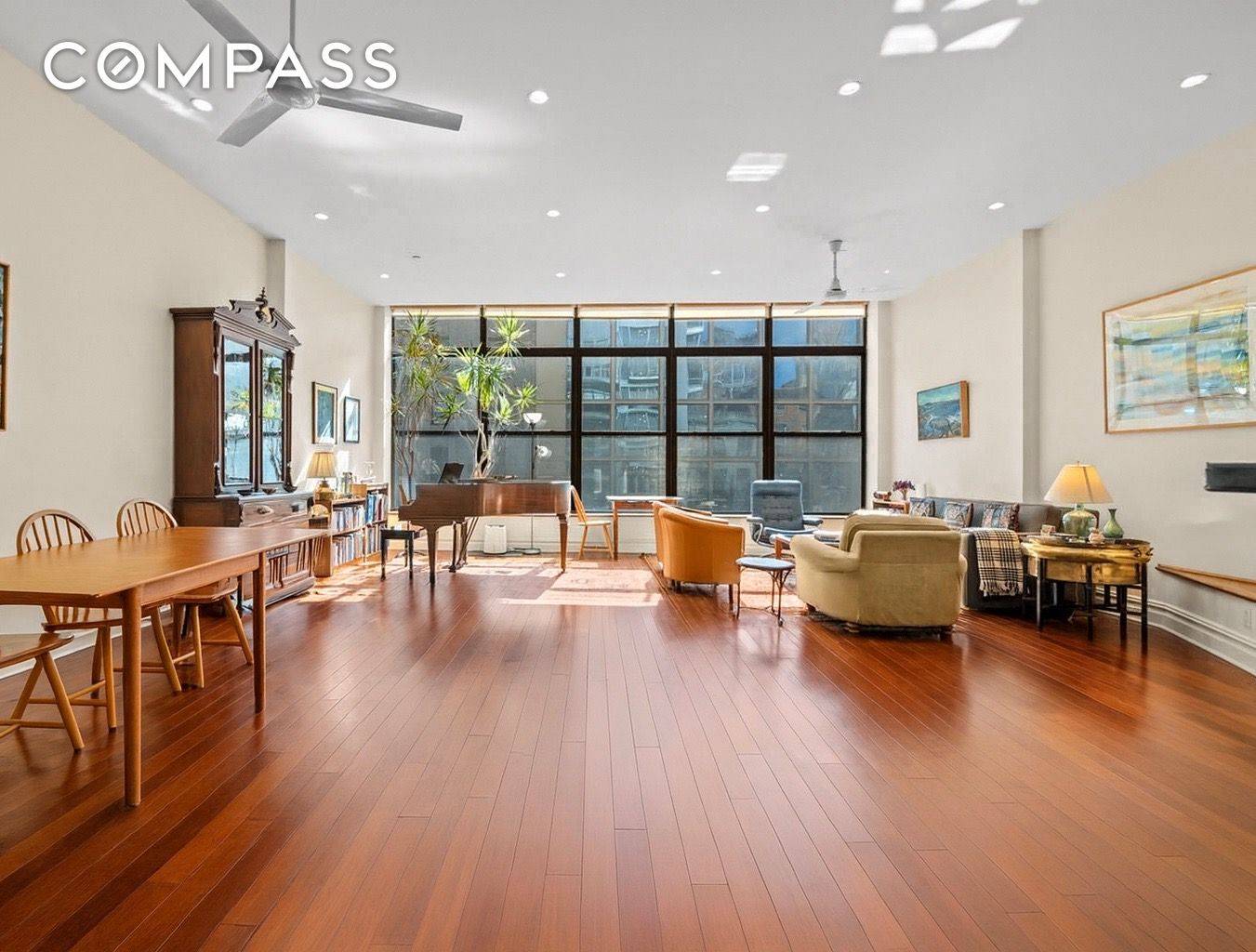 A sprawling private terrace, enveloped in serenity and seclusion, sets the stage for this extraordinary residence on the third floor of 133 West 14th Street.