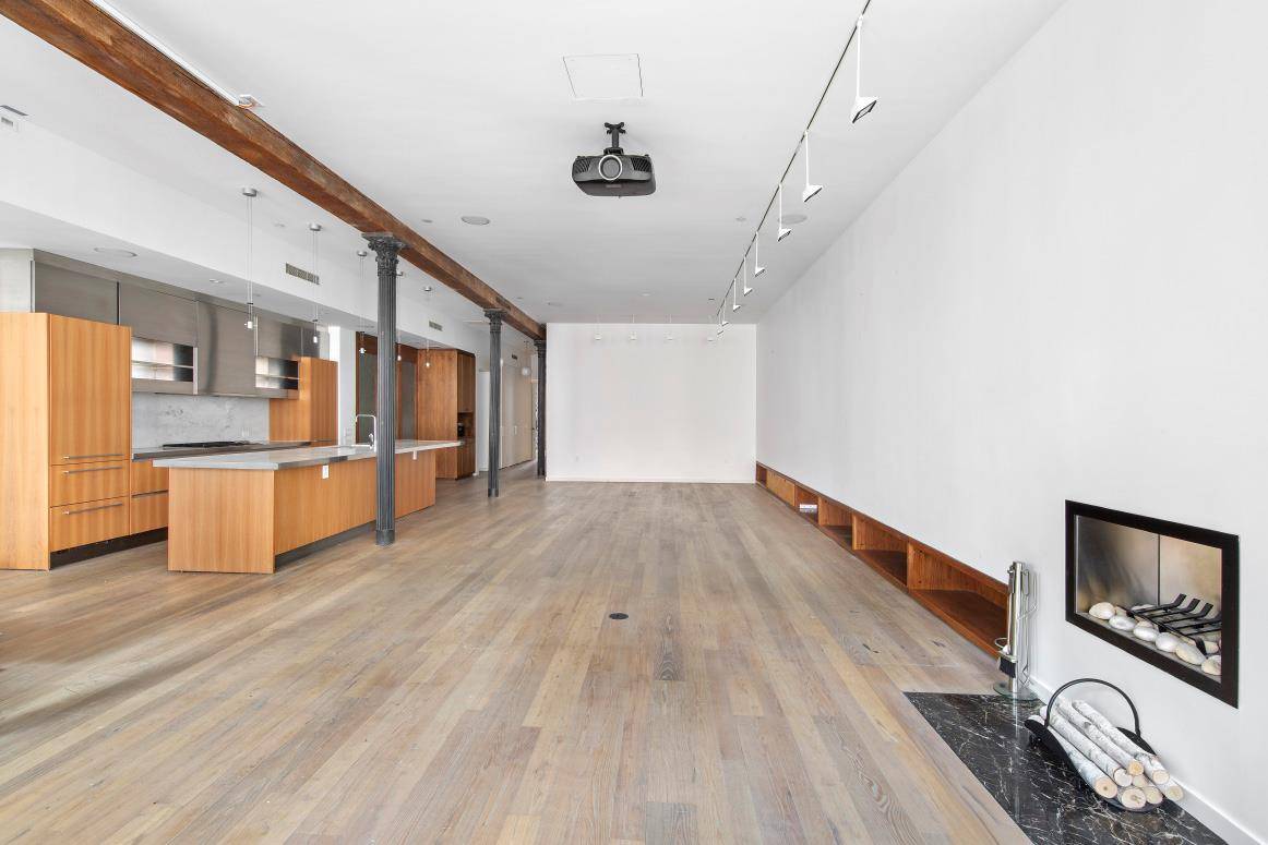 Full floor Soho Loft with keyed elevator and 11 foot ceilings is a rare find !