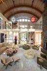 beam ceiling, stairs, and high vaulted ceiling